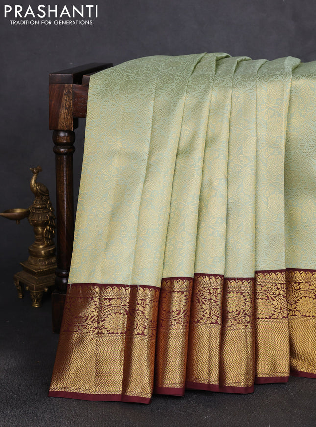 Pure kanchipuram silk saree pista green and maroon with allover zari woven brocade weaves and long rich zari woven border