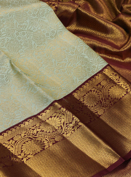 Pure kanchipuram silk saree pista green and maroon with allover zari woven brocade weaves and long rich zari woven border