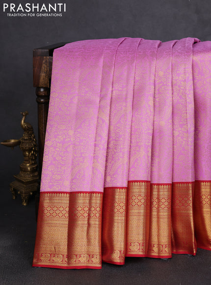Pure kanchipuram silk saree lotus pink and red with allover zari woven brocade weaves and long rich zari woven border