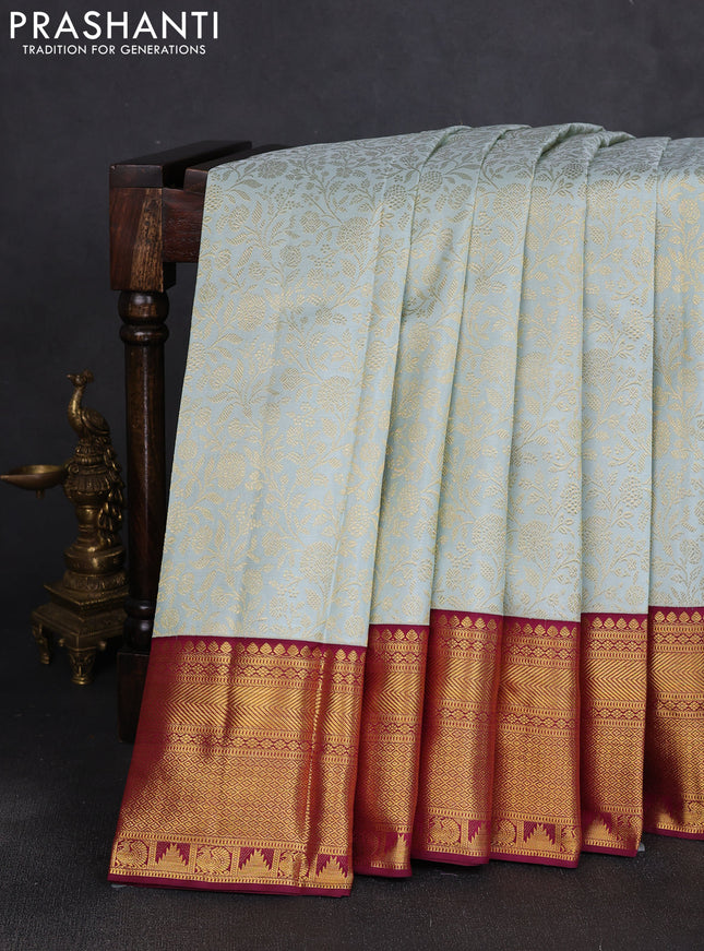 Pure kanchipuram silk saree pastel blue and wine shade with allover zari woven brocade weaves and rich zari woven border