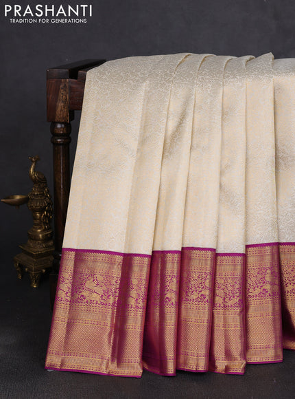 Pure kanchipuram silk saree cream and purple with allover zari woven brocade weaves and long rich zari woven border