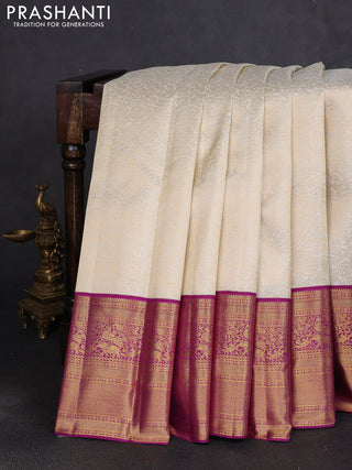 Pure kanchipuram silk saree cream and purple with allover zari woven brocade weaves and long rich zari woven border