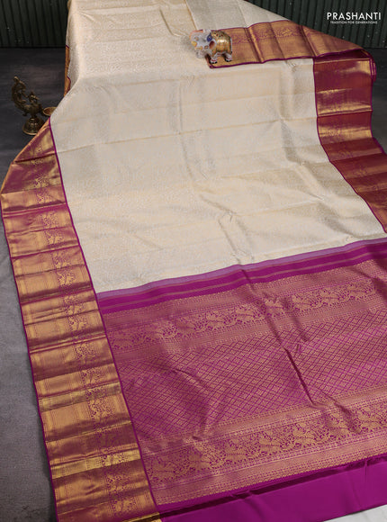 Pure kanchipuram silk saree cream and purple with allover zari woven brocade weaves and long rich zari woven border