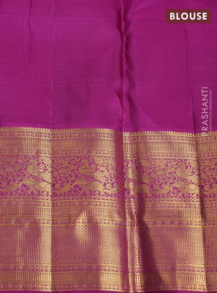 Pure kanchipuram silk saree cream and purple with allover zari woven brocade weaves and long rich zari woven border