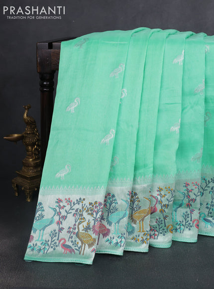 Banarasi raw silk saree teal green shade with silver zari woven buttas and silver zari woven border