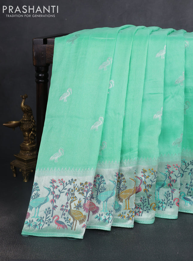 Banarasi raw silk saree teal green shade with silver zari woven buttas and silver zari woven border