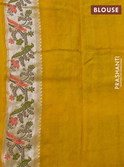 Banarasi raw silk saree yellow with silver zari woven geometric buttas and long silver zari woven border