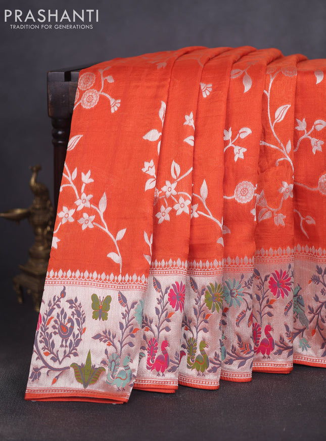 Banarasi raw silk saree orange with allover floral silver zari weaves and thread & silver zari woven border