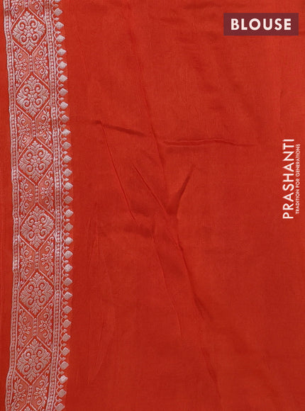 Banarasi raw silk saree orange with allover floral silver zari weaves and thread & silver zari woven border