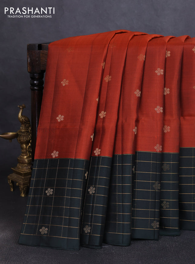 Pure soft silk saree rustic orange and bottle green with zari woven floral buttas and long zari woven checked border