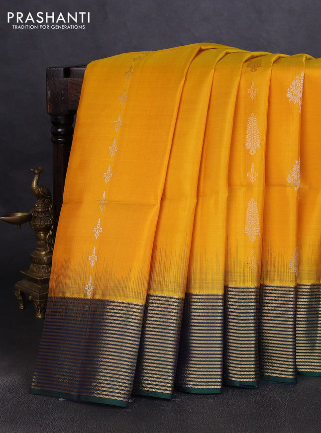 Pure soft silk saree yellow and dual shade of bottle green with silver & gold zari woven buttas and zari woven border