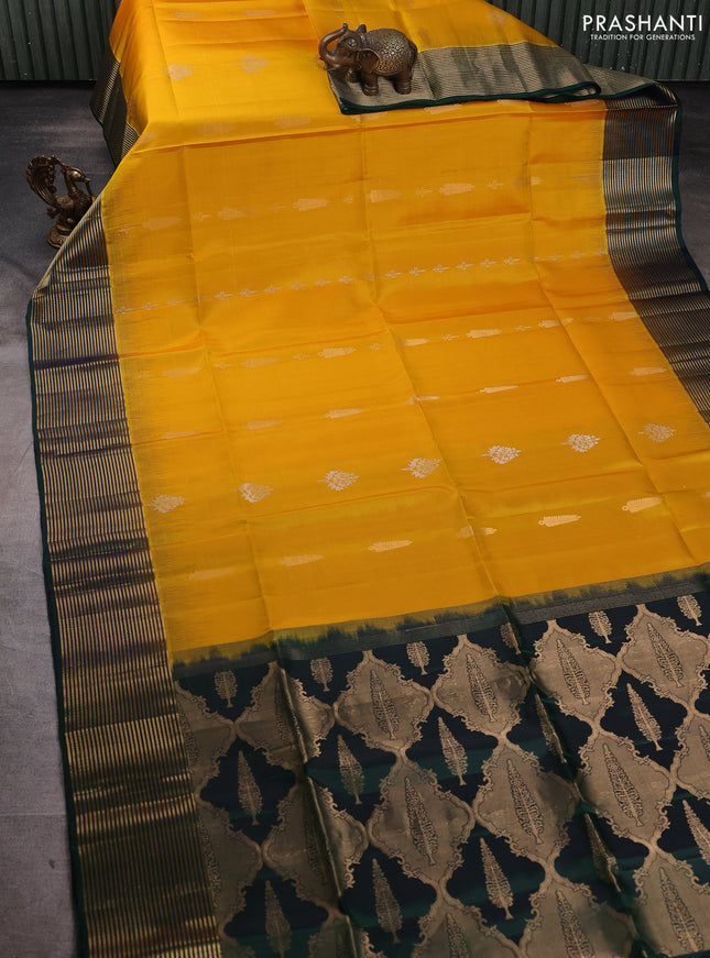 Pure soft silk saree yellow and dual shade of bottle green with silver & gold zari woven buttas and zari woven border