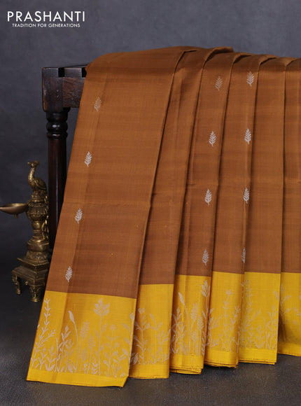 Pure soft silk saree dark mustard and yellow with zari woven buttas and zari woven border
