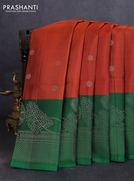 Pure soft silk saree rustic orange and green with allover zari woven buttas and long zari woven border