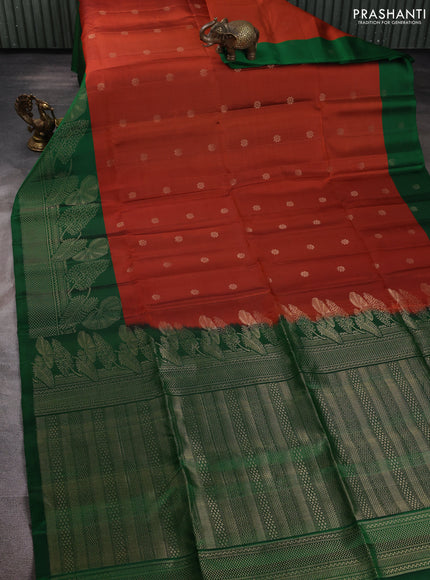 Pure soft silk saree rustic orange and green with allover zari woven buttas and long zari woven border