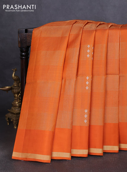 Pure soft silk saree orange with allover zari checks & buttas and simple zari woven border