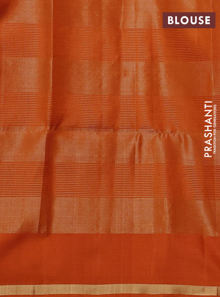 Pure soft silk saree orange with allover zari checks & buttas and simple zari woven border
