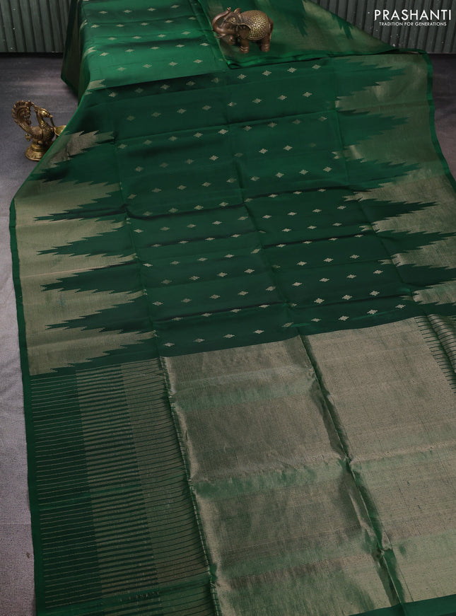 Pure soft silk saree green with zari woven geometric buttas and temple zari woven border