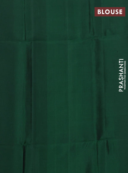 Pure soft silk saree green with zari woven geometric buttas and temple zari woven border