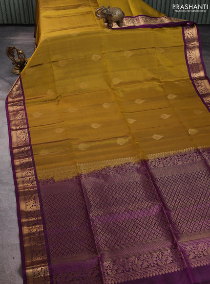 Pure soft silk saree mehendi green and purple with zari woven buttas and rich zari woven border