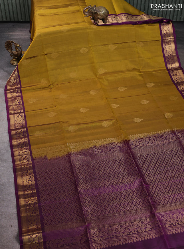 Pure soft silk saree mehendi green and purple with zari woven buttas and rich zari woven border