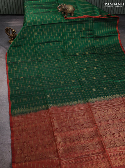 Pure soft silk saree green and rustic orange with allover zari checks & buttas and piping border