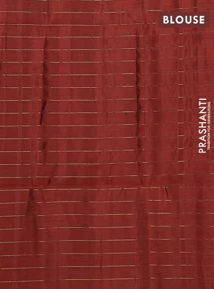 Pure soft silk saree green and rustic orange with allover zari checks & buttas and piping border