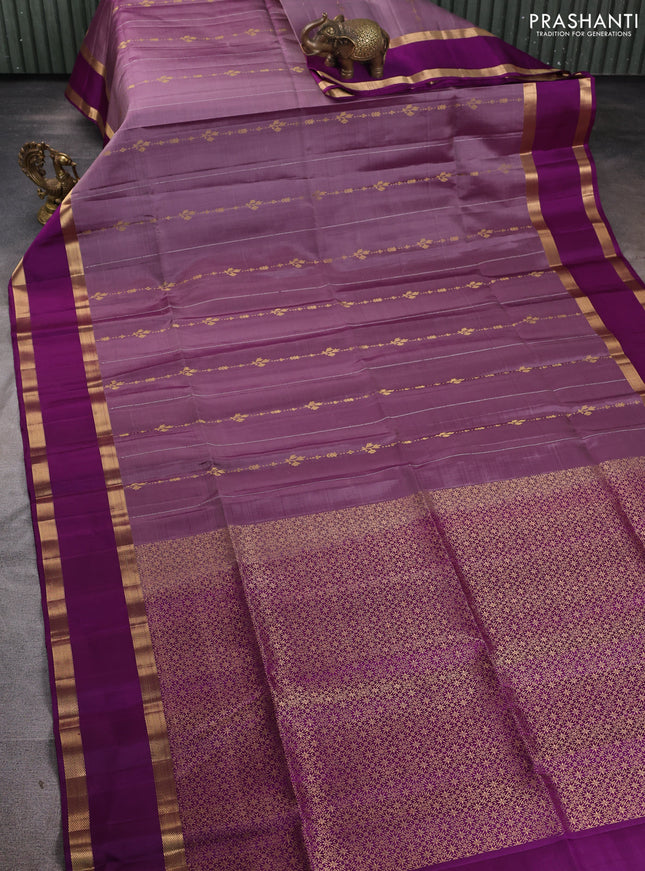 Pure soft silk saree pastel purple and purple with allover zari weaves and rettapet zari woven border