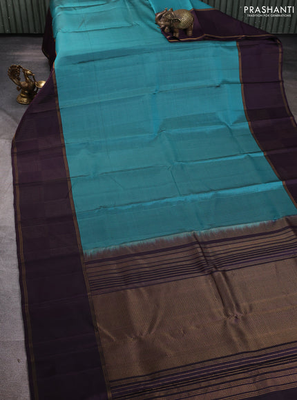Pure soft silk saree teal green shade and jamun shade with allover zari stripe pattern and long zari woven border