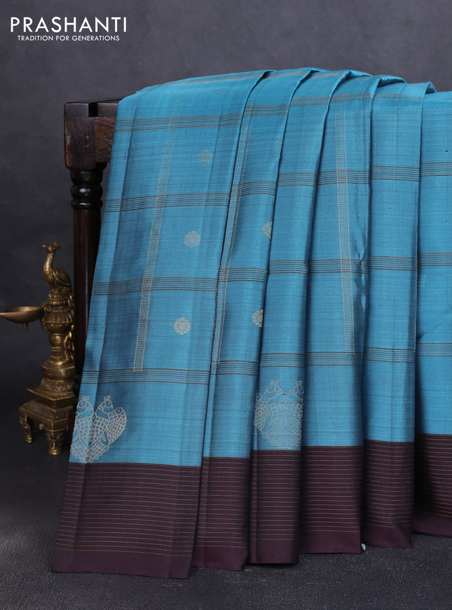 Pure soft silk saree pastel blue and wine shade with allover zari checks & buttas and zari woven border