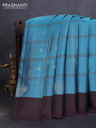 Pure soft silk saree pastel blue and wine shade with allover zari checks & buttas and zari woven border