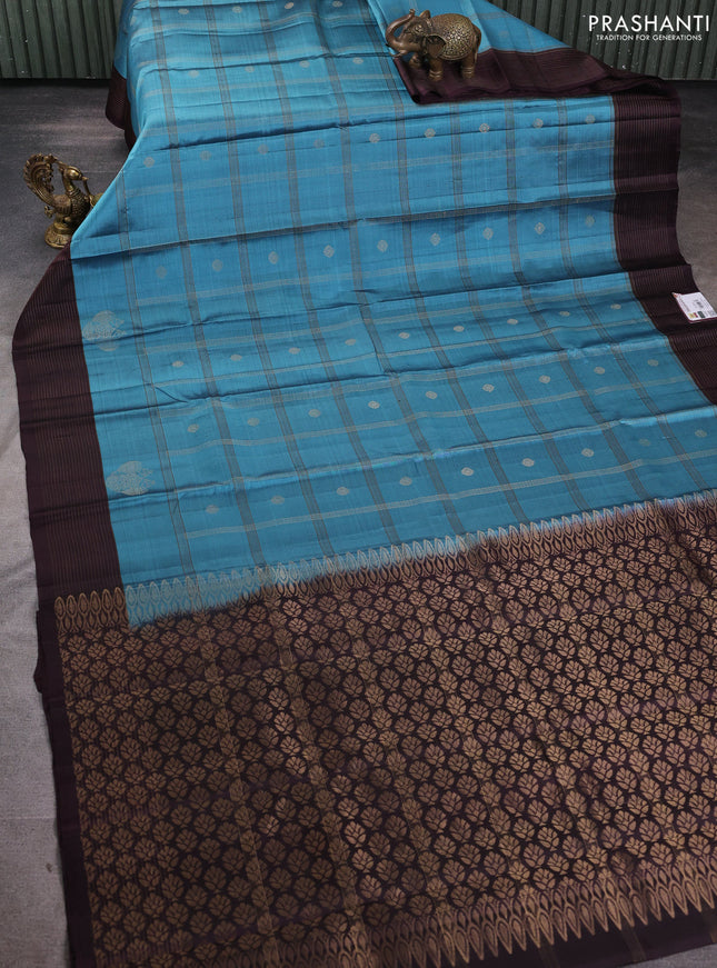 Pure soft silk saree pastel blue and wine shade with allover zari checks & buttas and zari woven border
