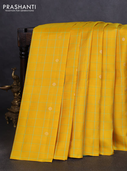 Pure soft silk saree yellow and dual shade of teal green with allover checks & zari buttas in borderless style