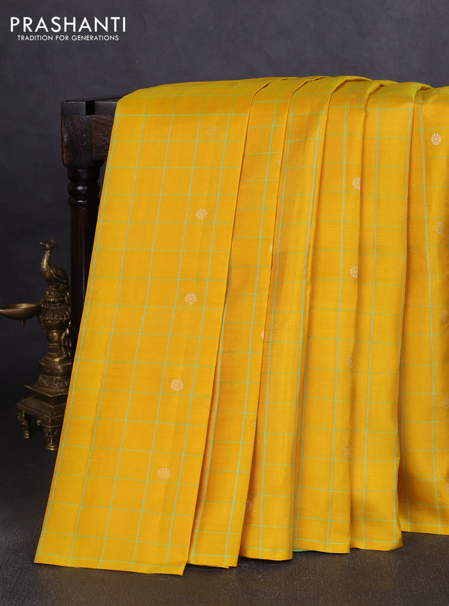 Pure soft silk saree yellow and dual shade of teal green with allover checks & zari buttas in borderless style