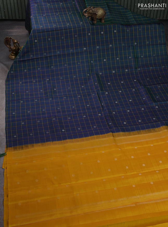 Pure soft silk saree dual shade of bluish green and yellow with allover checks & zari buttas in borderless style