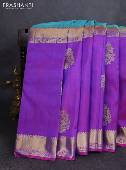Pure kanchipuram silk saree dual shade of teal blue and purple with half & half style and zari woven border