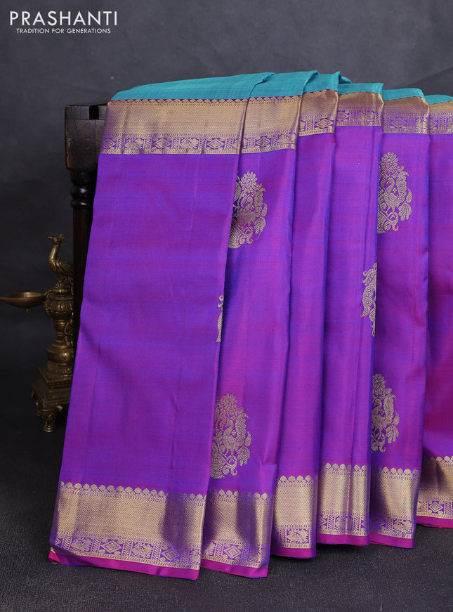 Pure kanchipuram silk saree dual shade of teal blue and purple with half & half style and zari woven border