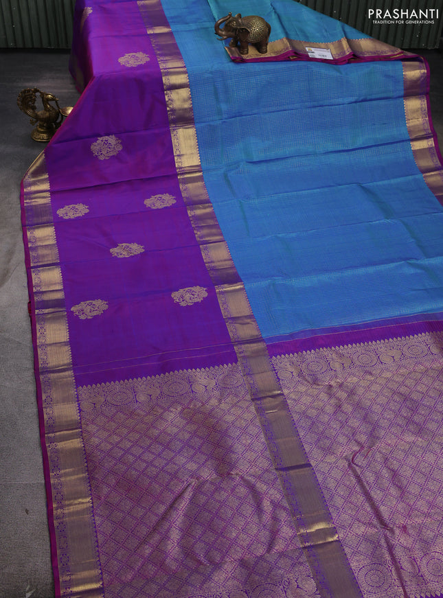 Pure kanchipuram silk saree dual shade of teal blue and purple with half & half style and zari woven border
