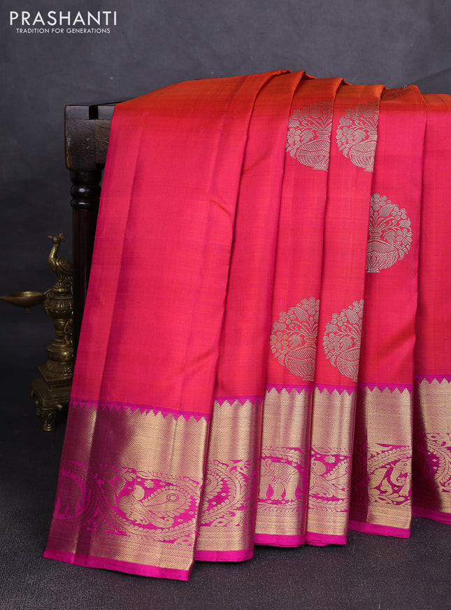 Pure kanchipuram silk saree dual shade of pinkish orange and pink with zari woven buttas and rich zari woven border