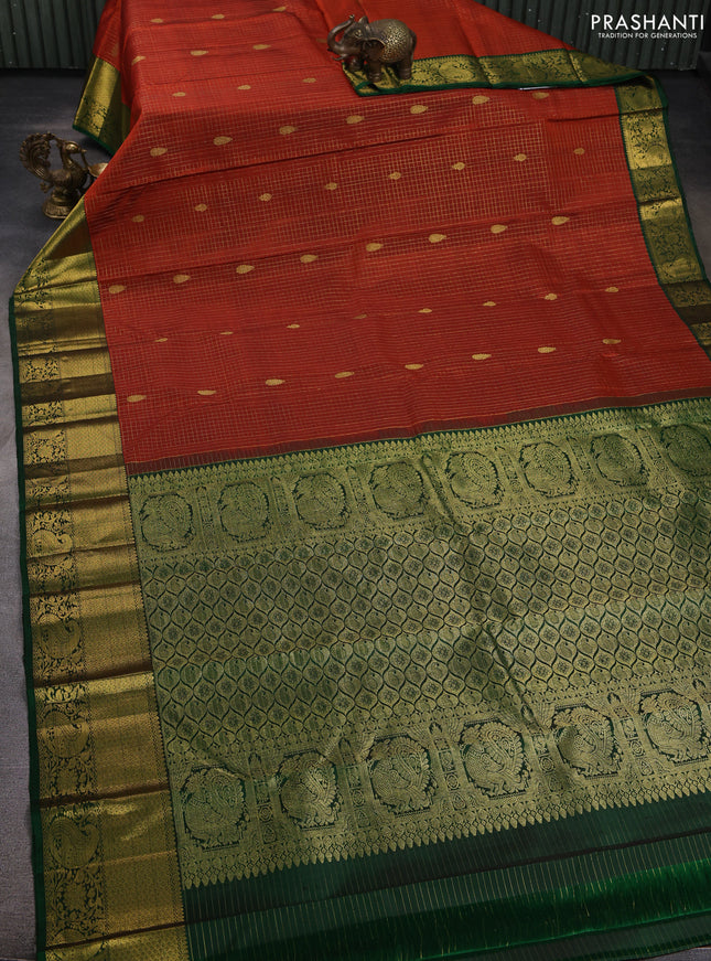 Pure kanchipuram silk saree rust shade and green with allover zari checks & buttas and zari woven border