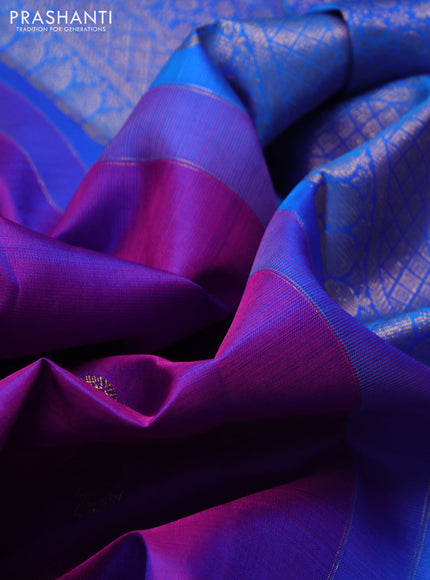 Pure kanchipuram silk saree purple and cs blue with allover zari woven buttas and long rettapet zari woven border