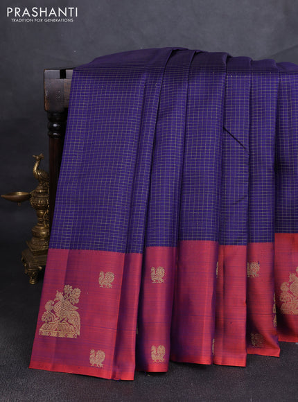 Pure kanchipuram silk saree navy blue and rustic orange with allover small zari checked pattern and long zari woven butta border