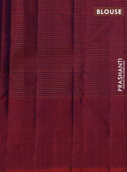 Pure kanchipuram silk saree navy blue and rustic orange with allover small zari checked pattern and long zari woven butta border