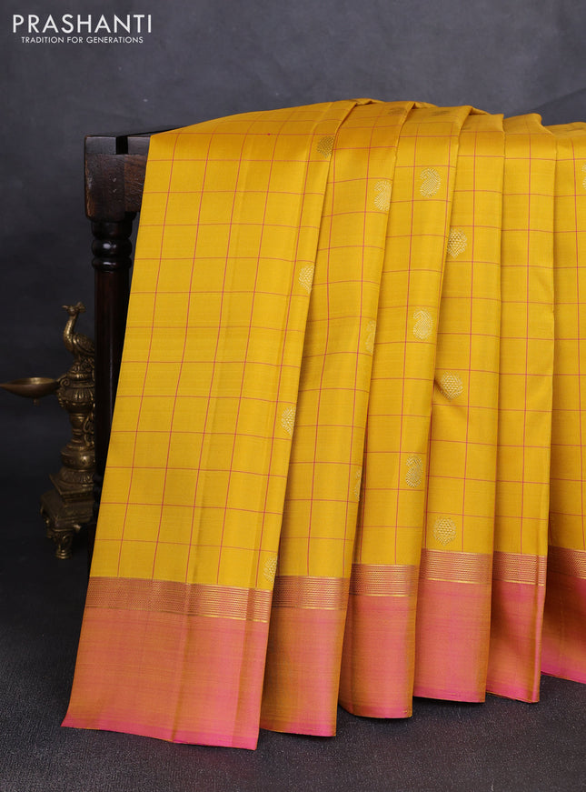 Pure kanchipuram silk saree mustard yellow and pink with allover thread checks & buttas and zari woven simple border