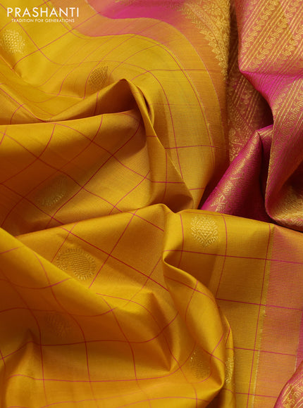 Pure kanchipuram silk saree mustard yellow and pink with allover thread checks & buttas and zari woven simple border