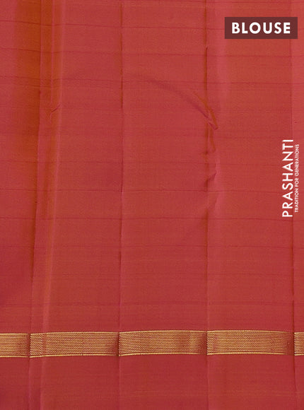 Pure kanchipuram silk saree light green and pink with allover thread checks & buttas and zari woven simple border