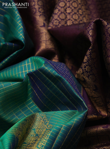 Pure kanchipuram silk saree dual shade of bluish green and navy blue with allover zari checks & buttas and long simple zari woven buttas