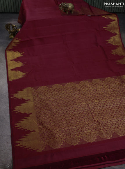 Pure kanchipuram silk saree deep maroon with plain body and temple zari woven border
