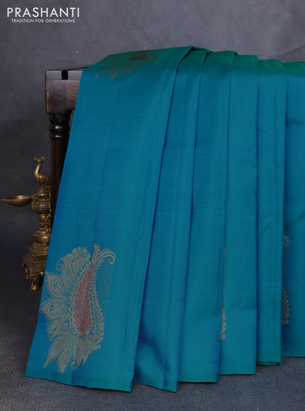 Pure kanchipuram silk saree cs blue and dual shade of pinkish orange with zari woven buttas in borderless style
