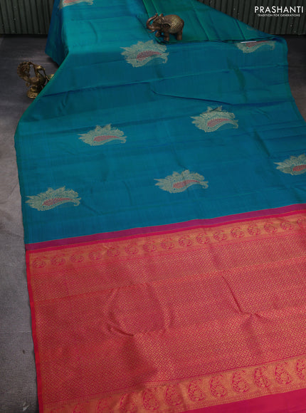 Pure kanchipuram silk saree cs blue and dual shade of pinkish orange with zari woven buttas in borderless style